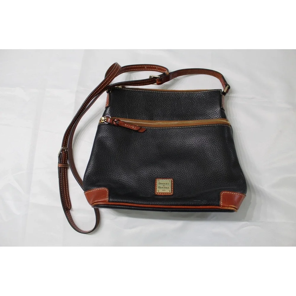 Dooney & Bourke Black Pebbled Leather Crossbody Bag with Tan Trim and Red Lining